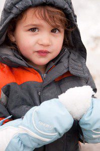 Pasadena child holding snowball