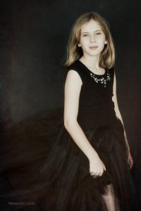 Teenaged girl in black tulle skirt Rebecca Little Photography