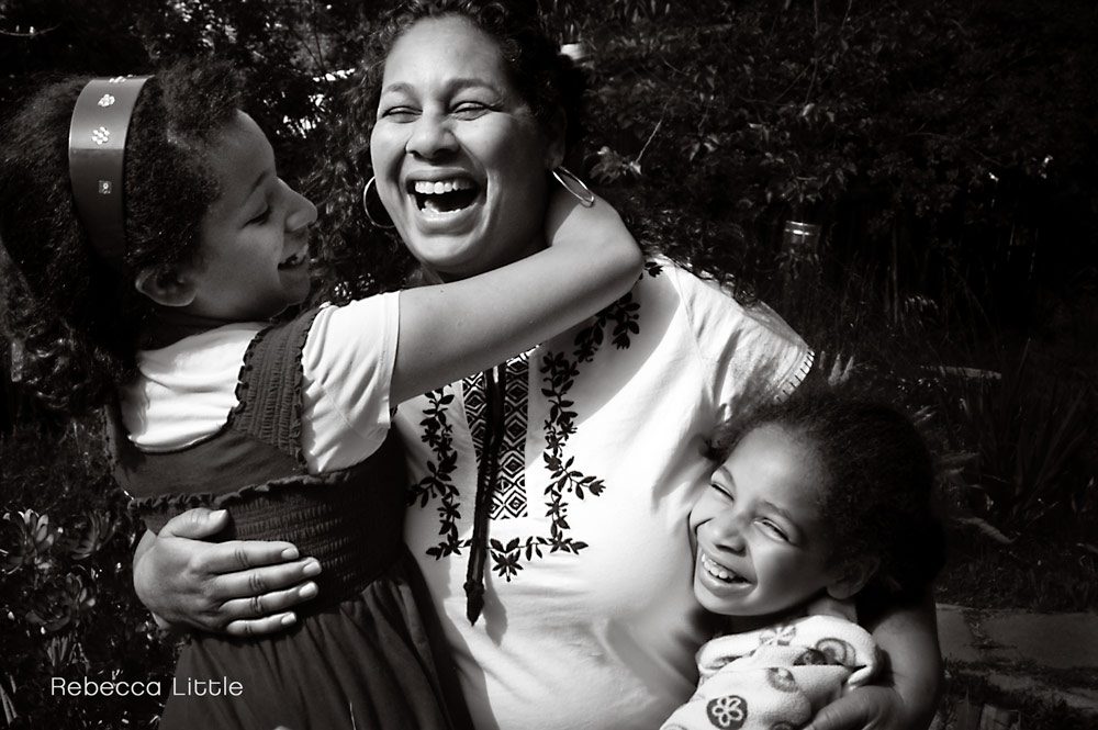 A mom and her daughters black and white  portrait in La Canada relaxed family lifestyle photos by Rebecca Little Photography in Pasadena CA