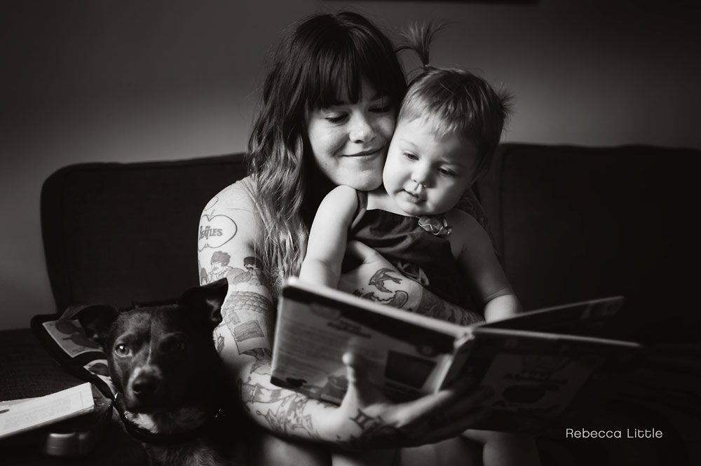 Black and white photo of mom reading to her daughter relaxed family lifestyle photos in South Pasadena, Los Angeles and Southern California by Rebecca Little Photography Pasadena CA