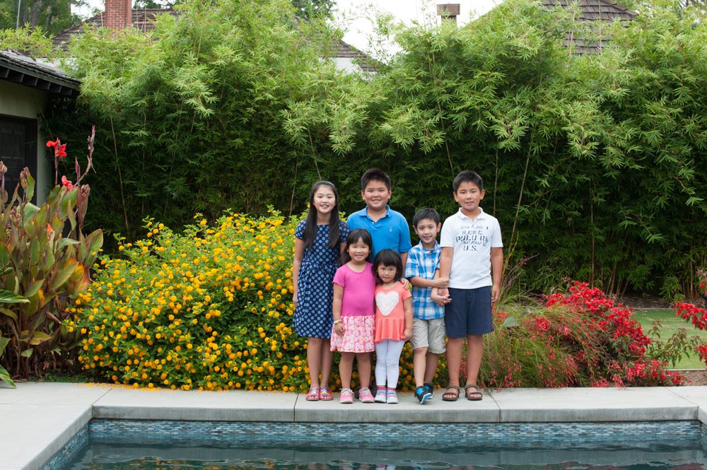 This San Marino family wanted family photos of their grandma and grandpa parents children and cousins We all met at their San Marino home in the morning and created these family photos around the swimming pool and in their lush green backyard I love having a session at someone's home where all the kids feel comfortable If you need photos for Christmas cards or hanukkah cards or New Years cards please contact me so i can create holiday family photos for you in an outdoor location close to San Marino or La Canada or Pasadena or South Pasadena Rebecca Little Photography Green St studio near the South Lake Ave district